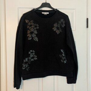 Gerard Darel: Black sweater with faux leather flower applique (size L)